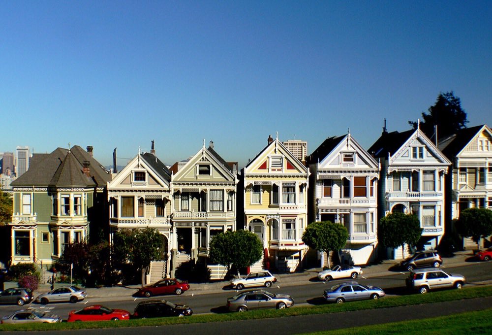 The Painted Ladies row of Victorian houses in San Francisco with ornate gables, bay windows, and decorative trim
